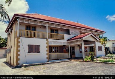 New Caledonia - cream building with red roof