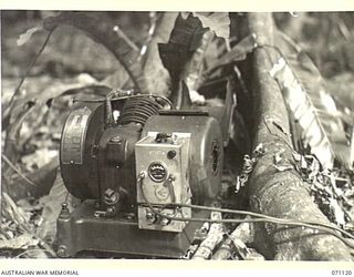 KILIGIA, NEW GUINEA, 1944-03-12. THE "JOHNSON CHORE HORSE" 12 VOLT 300 WATT BATTERY CHARGING SET, VIEWED FROM A CLOSE DISTANCE