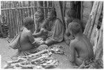 Elota's family eating evening meal