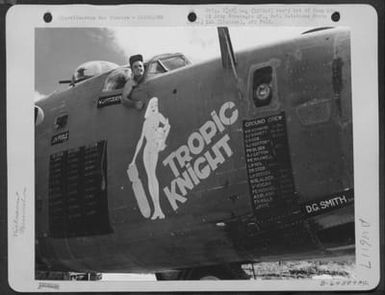M/Sgt. Eddie Cox Of Sapulpa, Oklahoma, Waves From The Cockpit Of The Consolidated B-24 Liberator "Tropic Knight". Saipan, Marianas Islands, 1944. (U.S. Air Force Number B64389AC)