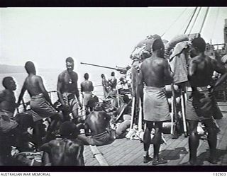 RABUAL, NEW GUINEA. TROOPS FROM THE PAPUAN INFANTRY ON BOARD HMAS KANIMBLA