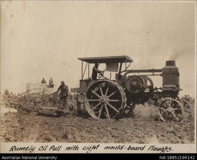 Rumely oil pull tractor with eight mould-board ploughs