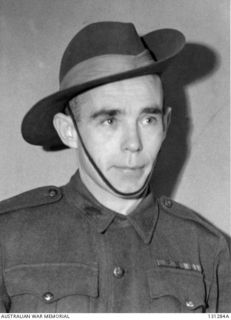 ROYAL PARK CAMP, VICTORIA, 1946-09-06. PRIVATE R. KELLIHER, VC, QX20656, 2/25TH BATTALION, AIF. PRIVATE KELLIHER WAS AWARDED THE VICTORIA CROSS FOR BRAVERY AT HEATH PLANTATION NEAR LAE, NEW GUINEA, ..