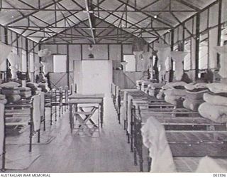 PORT MORSEBY, PAPUA. INTERIOR OF A NEWLY CONSTRUCTED RAAF BARRACKS AT KONEDOBU CAMP. (PHOTOGRAPHER N. J. TRACEY )