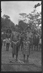 Villagers, two women with infant