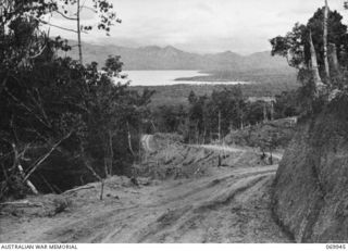 MILNE BAY, NEW GUINEA. 1943-03. A VIEW OF THE BAY TAKEN FROM THE PARTLY CONSTRUCTED HILL STATION ROAD