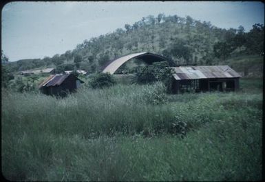 Wartime residue near the airport : Port Moresby, Papua New Guinea, 1953 / Terence and Margaret Spencer