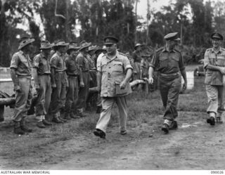 BOUGAINVILLE. 1945-03-24. GENERAL SIR THOMAS A. BLAMEY, COMMANDER-IN-CHIEF, ALLIED LAND FORCES, SOUTH WEST PACIFIC AREA (1), ACCOMPANIED BY BRIGADIER H.H. HAMMER, COMMANDER 15 INFANTRY BRIGADE (2), ..