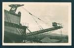 View of stacker dredging gold, Bulolo Gold Dredging mine, Bulolo, New Guinea, c1932 to 1933