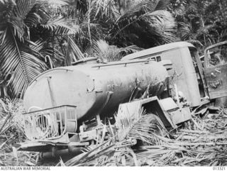 1942-10-01. NEW GUINEA. MILNE BAY. A PETROL WAGGON CAPTURED BY AUSTRALIAN TROOPS DURING THE UNSUCCESSFUL JAPANESE ATTACK ON MILNE BAY