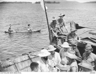 SORAKEN PENINSULA, BOUGAINVILLE. 1945-09-14. A MOTOR LAUNCH CARRYING MEMBERS OF HEADQUARTERS 2 CORPS, PREPARED FOR SURRENDER DISCUSSIONS WITH THE JAPANESE AT A SEA RENDEZVOUS OFF SORAKEN PENINSULA, ..