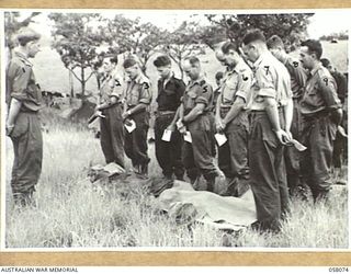 RAMU VALLEY, NEW GUINEA. 1943-10-20. CHURCH OF ENGLAND PARADE AT HEADQUARTERS, 21ST AUSTRALIAN INFANTRY BRIGADE, CONDUCTED BY PADRE H. NORMAN, OF 2/27 AUSTRALIAN INFANTRY BATTALION. SHOWN ARE:- ..