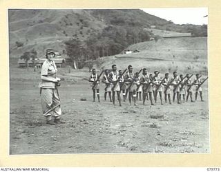 NADZAB, NEW GUINEA. 1944-12-05. MRS V. FISHER, BRITISH WAR CORRESPONDENT (1) DURING HER VISIT TO THE NEW GUINEA INFANTRY BATTALION