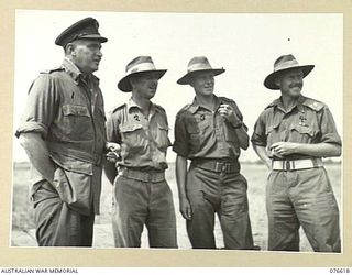 WAWIN, MARKHAM VALLEY, NEW GUINEA. 1944-10-24. NX4 BRIGADIER B.E. KLEIN, COMMANDER ROYAL ARTILLERY, 3RD DIVISION (1) AND UNIT COMMADERS AFTER HIS INSPECTION OF THE ROYAL AUSTRALIAN ARTILLERY UNITS ..