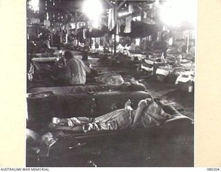 THE INTERIOR OF THE MAIN HOSPITAL WARD AT THE 2/11TH GENERAL HOSPITAL, AUSTRALIAN ARMY MEDICAL CORPS
