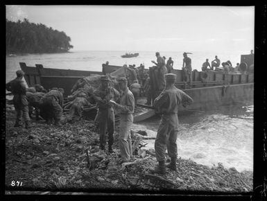 World War II troops of 3 (NZ) Division checking equipment on Vella Lavella Island, Solomon Islands, before being moved north