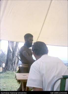 Man collecting ballot form