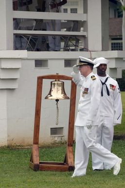 US Navy (USN) Captain (CPT) William B. Parker salutes as he departs a Unit Integration Ceremony at Pearl Harbor Naval Base, Hawaii (HI). During the Ceremony the Naval Dental Center Pearl Harbor and Naval Medical Clinic Pearl Harbor, merged to become the Naval Health Clinic Hawaii