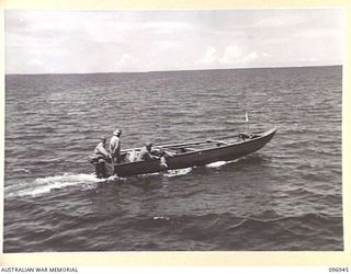 BOUGAINVILLE, 1945-09-17. THE JAPANESE ESCORT BARGE IN NUMA NUMA HARBOUR WHICH WILL MEET THE VESSEL CARRYING THE SURRENDER COMMISSIONER AND PARTY FROM HEADQUARTERS 2 CORPS, AND ESCORT THEM INTO THE ..