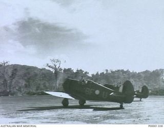 THE SOLOMON ISLANDS, 1945-01-12. TWO BOOMERANG AIRCRAFT FROM NO 5 SQUADRON, RAAF, AT PIVA AIRSTRIP. (RNZAF OFFICIAL PHOTOGRAPH.)