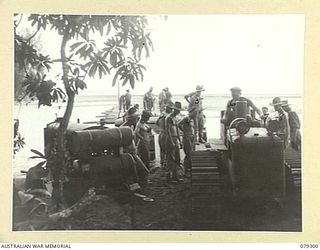 BOUGAINVILLE ISLAND. 1945-02-26. SAPPERS OF THE 5TH FIELD COMPANY, REPLACING A JEEP BRIDGE WITH A HEAVIER STRUCTURE ON A SECTION OF THE MAWARAKA- MOSIGETTA ROAD