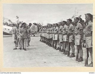 TOROKINA, BOUGAINVILLE, 1945-06-13. THE GOVERNOR GENERAL OF NEW ZEALAND, MARSHAL OF THE ROYAL AIR FORCE, SIR CYRIL L.N. NEWALL (3); ON ARRIVAL AT PIVA AIRSTRIP, INSPECTING THE GUARD OF HONOUR, ..