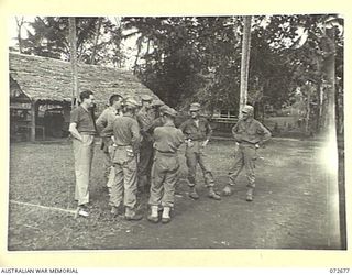 HIGITURA, NEW GUINEA. 1944-04-27. THE HONOURABLE E.J. WARD, MINISTER FOR EXTERNAL TERRITORIES IN THE AUSTRALIAN GOVERNEMNT (1), AND MAJOR-GENERAL B.M. MORRIS, DSO, GOC AUSTRALIAN NEW GUINEA ..