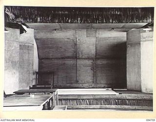LAE AREA, NEW GUINEA, 1945-08-10. THE STAGE AT THE CHARING CROSS EDUCATION CENTRE UNDER THE COMMAND OF THE DEPUTY ASSISTANT DIRECTOR OF EDUCATION, LAE BASE SUB-AREA