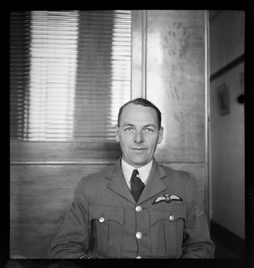 Flight Lieutenant E A Watchlin, in uniform, 5 Squadron Fiji