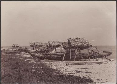 Sailing canoes on the beach, Pileni, Reef Islands, Swallow Group, Solomon Islands, 1906 / J.W. Beattie