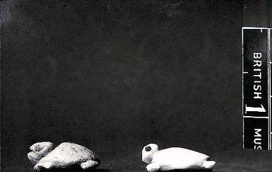 Photo of two carvings shaped like turtles (LIV/21)