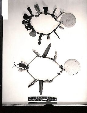 Photo of two objects, possibly necklaces