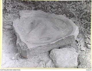 PORT MORESBY - NATIVE AXE AND SPEAR SHARPENING STONE, NORTH OF ELA BEACH, ABOUT 3 MILES ON SO CALLED HOLY GROUND. (NEGATIVE BY N. TRACY)