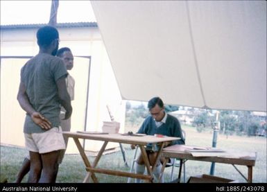 Man collecting ballot paper
