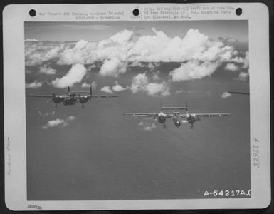 Northrop P-61 'Black Widows' In Flight. Saipan, Mariansa Islands, January 1945. (U.S. Air Force Number A64217AC)