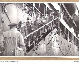 TOWNSVILLE, NORTH QUEENSLAND, AUSTRALIA. 1944-06-27. AUSTRALIAN ARMY NURSING SERVICE PERSONNEL DISEMBARKING FROM THE H.M.T. "ORMISTON" ON THEIR RETURN FROM NEW GUINEA