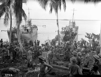 Unloading of men, vehicles and equipment on Nissan Island, Papua New Guinea