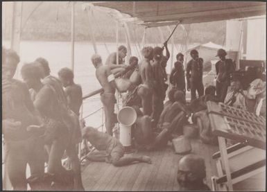 Bishop Wilson with Vella Lavella people on the Southern Cross, Solomon Islands, 1906, 3 / J.W. Beattie