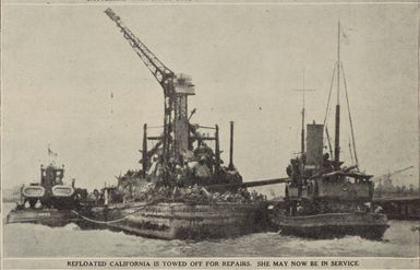 After being refloated, the U.S.S. California is towed off for repairs