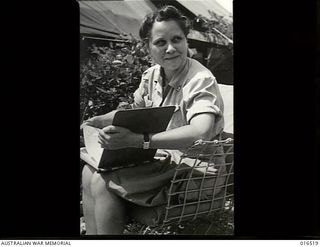 Pacific Area. c. 1943. An United States Army nurse relaxing off duty