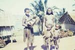 [Two women with three children], the two small children might be twins, and baby in typical wicker cradle, Lake Murray village, [Papua New Guinea], c1958