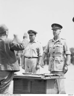 CAPE WOM, NEW GUINEA, 1945-09-13. LT-GEN H. ADACHI, COMD 18 JAPANESE ARMY IN NEW GUINEA, FORMALLY SURRENDERED TO MAJ-GEN H.C.H. ROBERTSON, GOC 6 DIVISION, IN A CEREMONY HELD AT CAPE WOM AIRSTRIP. ..