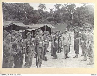 HONGORAI RIVER, BOUGAINVILLE, 1945-07-04. HIS ROYAL HIGHNESS, THE DUKE OF GLOUCESTER, GOVERNOR-GENERAL OF AUSTRALIA (1), SPEAKING TO BRIGADIER H.H. HAMMER (2), AND BRIGADIER W.B. SIMPSON (3), WHILE ..