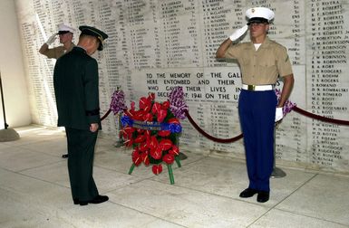 General Cho, Yung Kil (Left foreground), Chairman, Joint Chiefs of STAFF, Republic of Korea, pauses for a moment of silence during a wreath laying ceremony at USS Arizona Memorial at Pearl Harbor, Hawaii, on October 30th, 2000. The ceremony honored the 1,177 Sailors and Marines who lost their lives during the 1941 attack on Pearl Harbor. GEN Cho is in Hawaii this week attending the Chiefs of Defense Conference