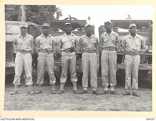 LAE AREA, NEW GUINEA. 1945-07-23. STAFF NON COMMISSIONED OFFICERS OF 35/31 AMERICAN TRUCK COMPANY, WHICH OPERATES AT LAE AND NADZAB TRANSPORTING AMERICAN AND AUSTRALIAN STORES