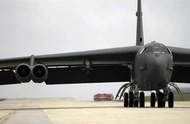 The first of six US Air Force (USAF) B-52 Stratofortress bombers from Minot Air Force Base (AFB), North Dakota (ND) taxis to their parking spaces after landing at Andersen Air Force Base (AFB), Guam (GU) in support of the US Pacific Command's (PACOM) request for a rotational bomber force