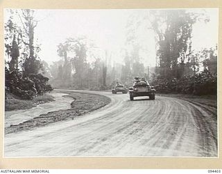 TOROKINA AREA, BOUGAINVILLE. 1945-07-23. M24 GENERAL CHAFFEE LIGHT TANKS TAKING PART IN SPEED TRIALS ON A RIGHT HAND CURVE DURING TESTS FOR THE WAR OFFICE