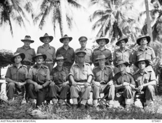 SIAR, NEW GUINEA. 1944-08-19. OFFICERS OF HEADQUARTERS 7TH INFANTRY BRIGADE. IDENTIFIED PERSONNEL ARE:- QX38334 LIEUTENANT L.A. WOOD (1); WX3174 LIEUTENANT R.A. BERTRAM (2); WX6440 CAPTAIN H.G. ..