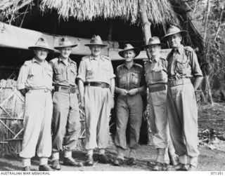 KILIGIA, NEW GUINEA, 1944-03-16. VX27 MAJOR-GENERAL A.H. RAMSAY, CBE, DSO, ED, (1) GOC, HEADQUARTERS, 5TH DIVISION, WITH HIS SENIOR OFFICERS. IDENTIFIED PERSONNEL ARE: VX55002 LIEUTENANT G.H. ..
