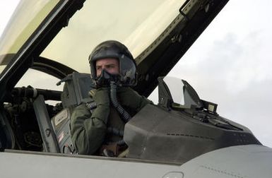 United States Air Force (USAF) Captain (CAPT) Scott Ulmer of the 35th Fighter Wing (FW) Misawa, Japan, prepares to taxis his F-16 Falcon on the Andersen Air Force Base (AFB) runway, on Guam, in support of Exercise COPE NORTH 2002